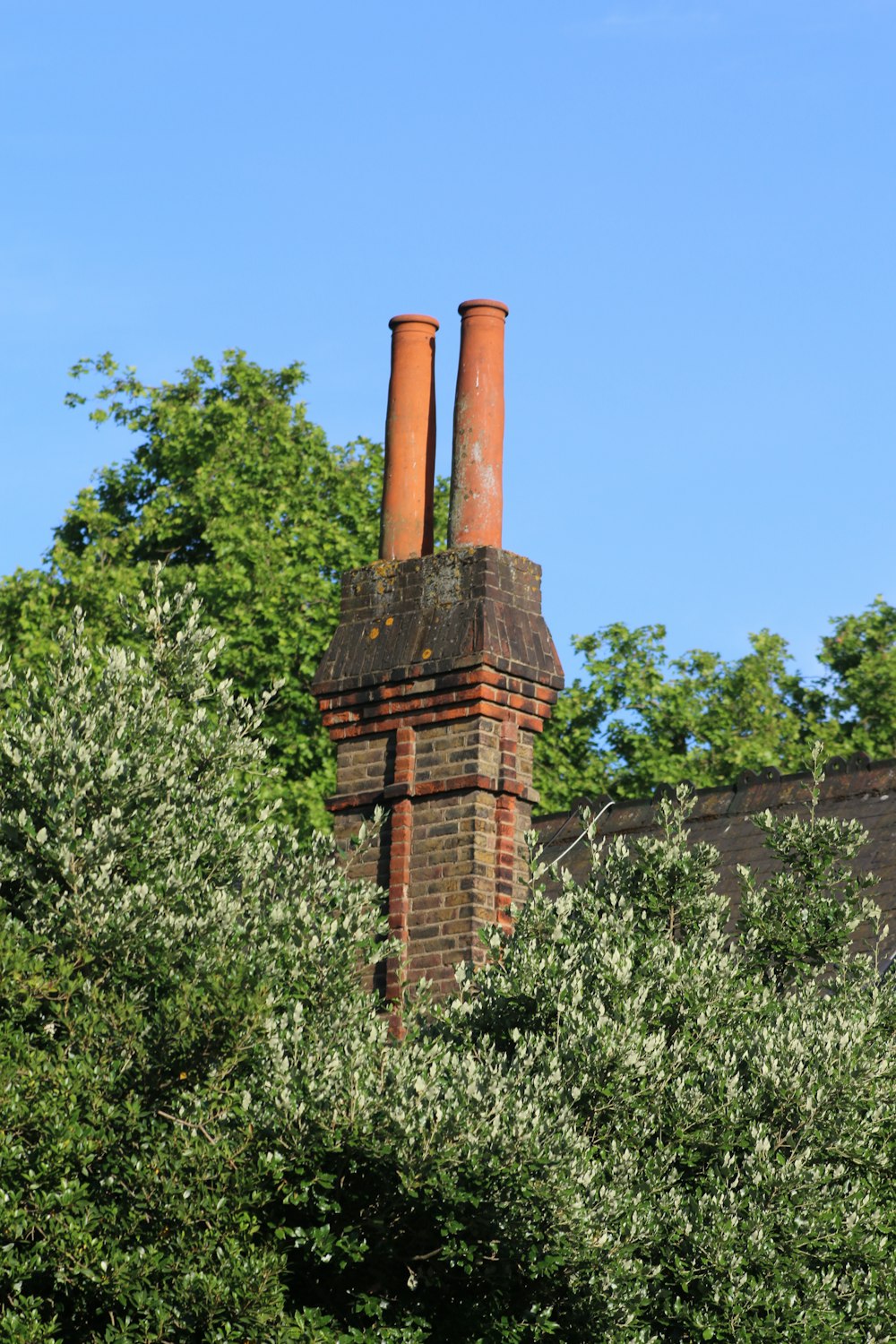 a brick chimney on a building