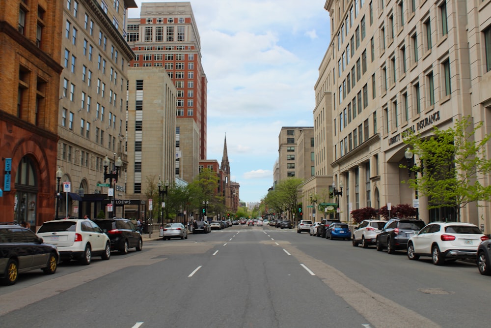 a street with cars and buildings on either side of it