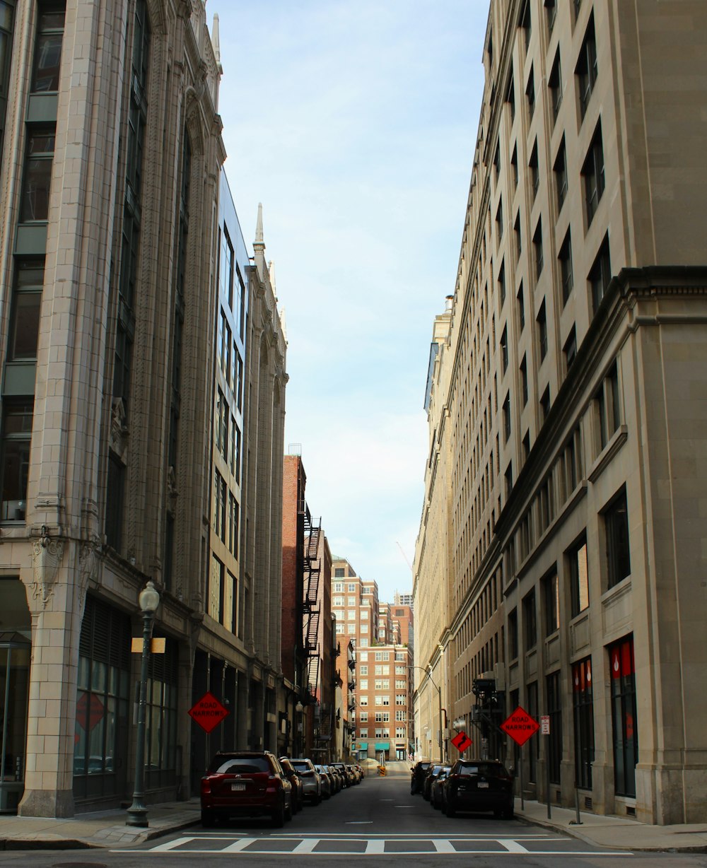 a street with cars and buildings on either side of it