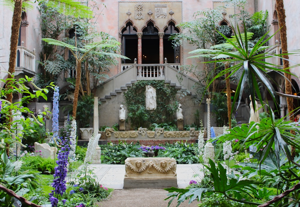 Isabella Stewart Gardner Museum with a fountain and plants