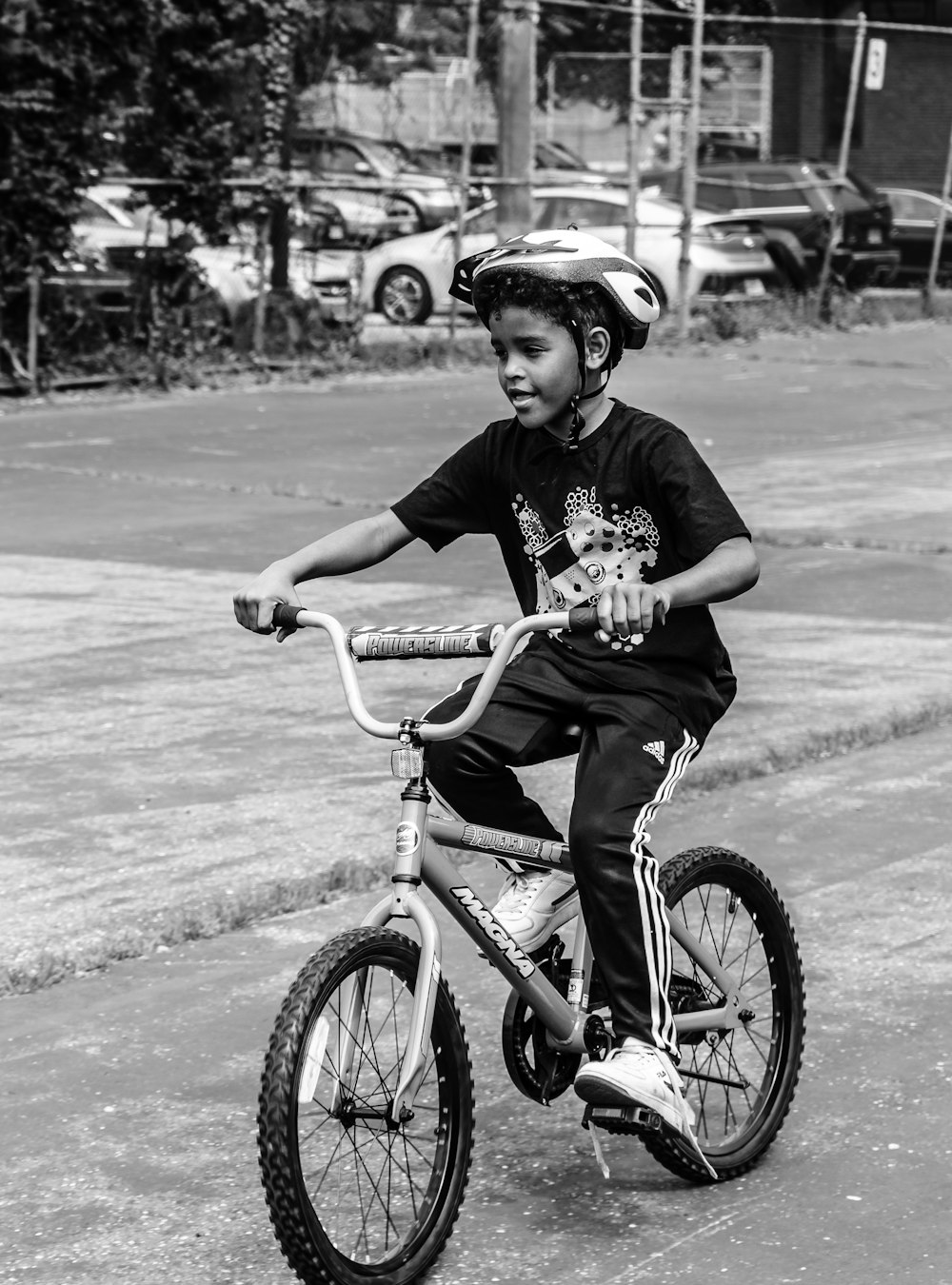 a boy riding a bicycle