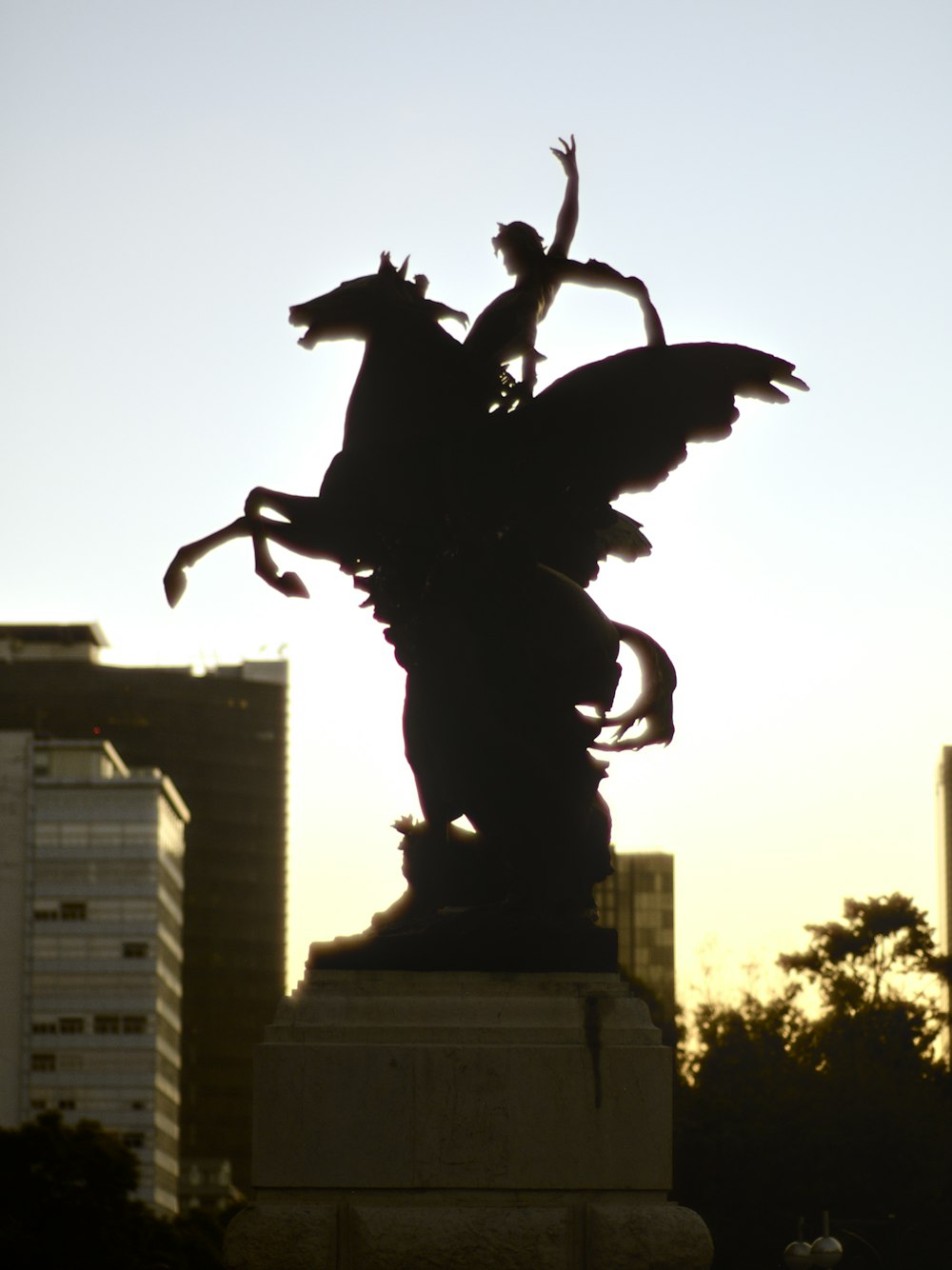 a statue of a man riding a horse