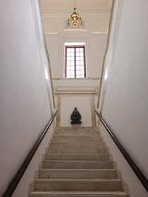 Shiny marble staircase reflecting light after crystallization treatment.