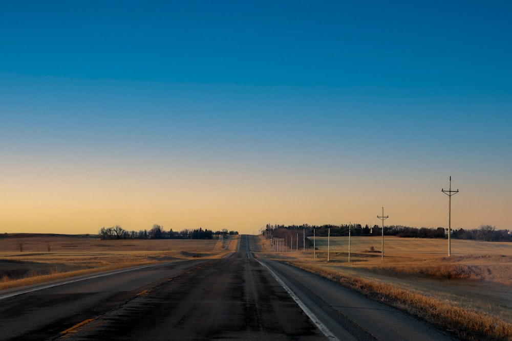 a road with a blue sky