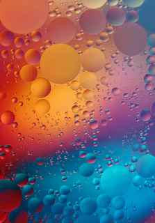 A vibrant animation of colorful bubbles floating against a sleek, modern background.