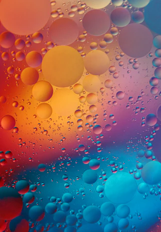 A vibrant animation of colorful bubbles floating against a sleek, modern background.