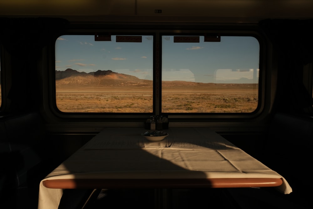 a view of the mountains from a window