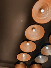 Interactive circle icons glowing on different rooms of the house plan.