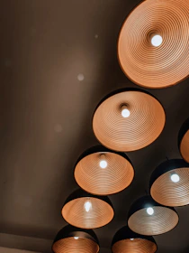 Interactive circle icons glowing on different rooms of the house plan.