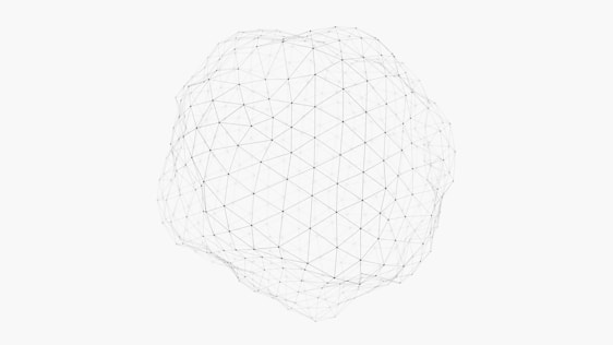 A geometric wireframe structure that appears spherical, composed of interconnected lines and nodes, set against a plain white background.