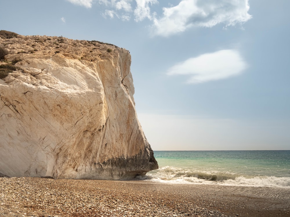 a large rock on a beach