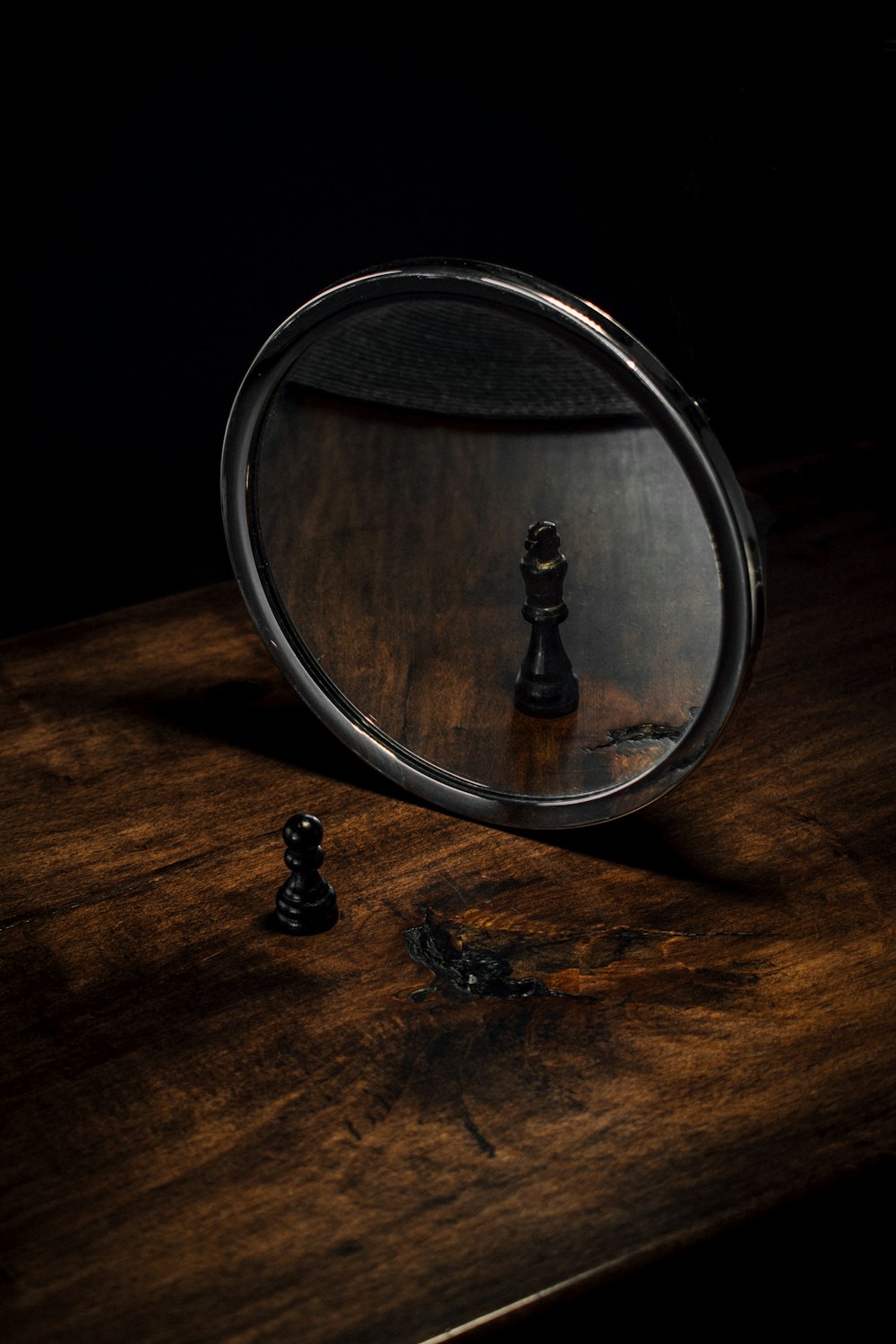 a black and white photo of a chess board and a black and white chessboard