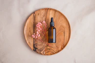 Close-up of aromatic patchouli oil droplets on a wooden spoon