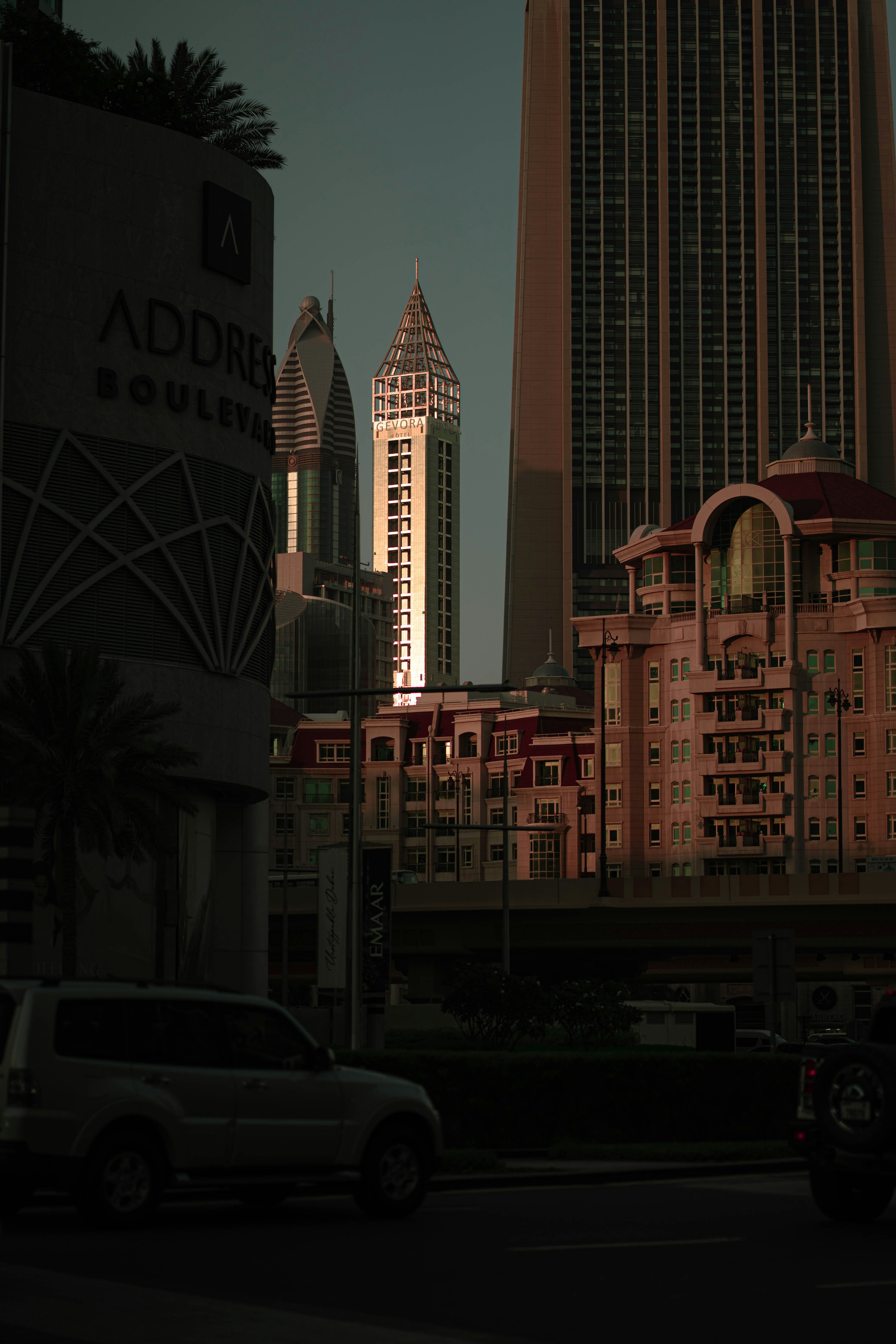 A city street with tall buildings photo – Free Street photography Image ...