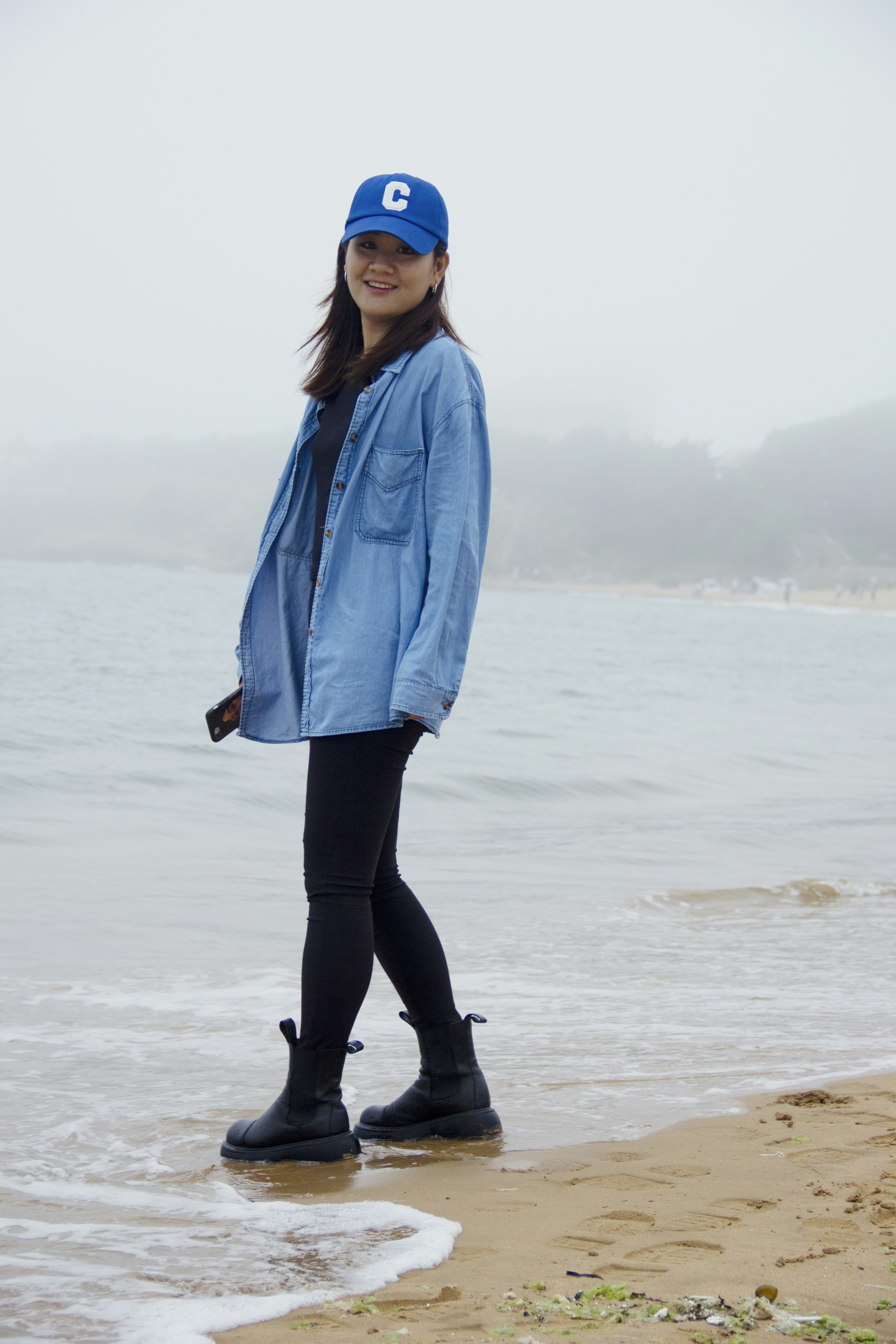 a person standing on a beach