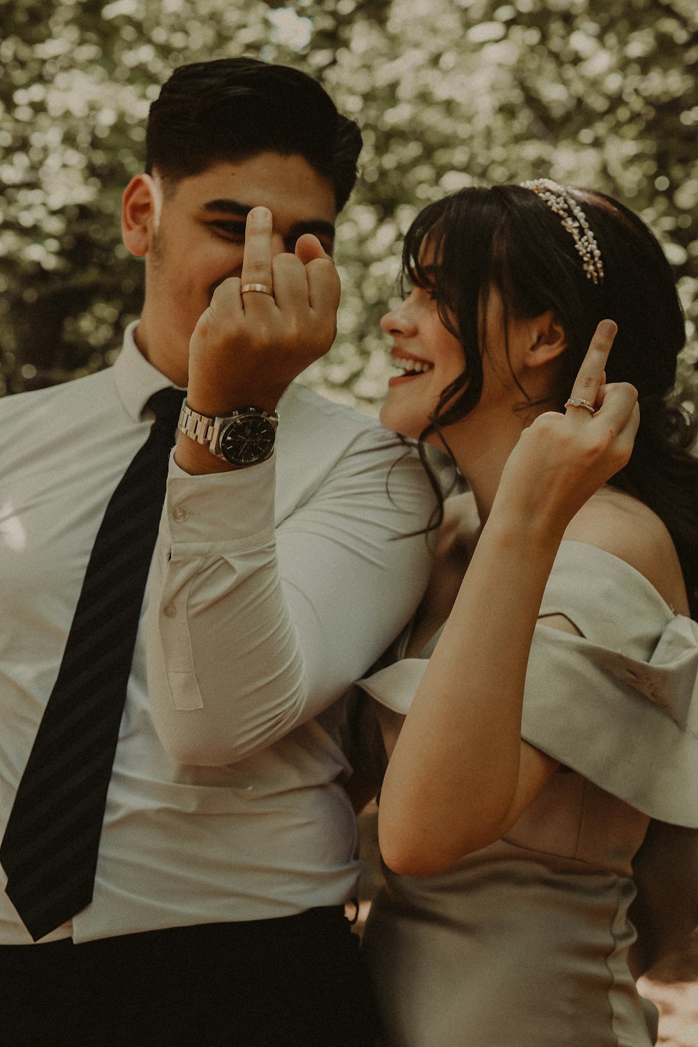 a man and woman posing for a picture