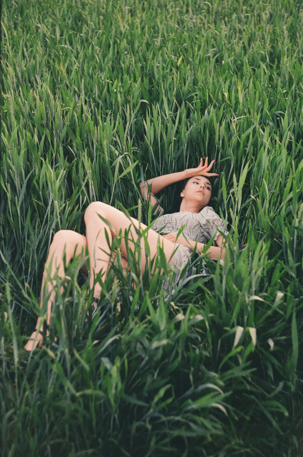 a person lying in the grass