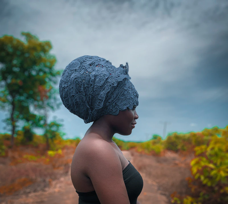 a woman with a large hat