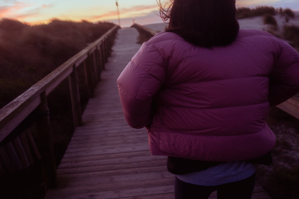 a person walking on a bridge