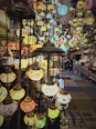 a room full of colorful lanterns