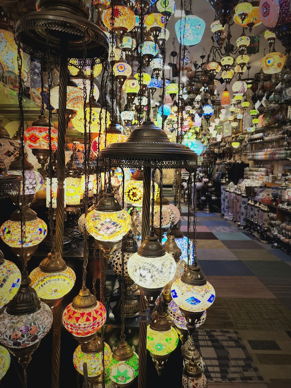 a room full of colorful lanterns