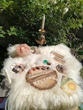 A mystical altar with candles, herbs, and crystals used in love spells.