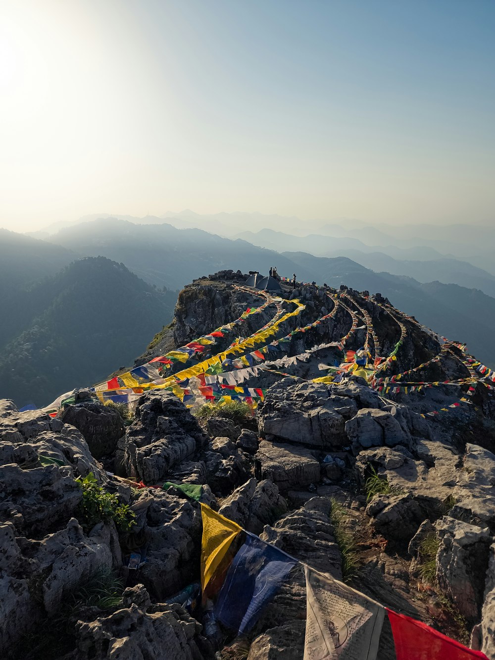 a group of people on a rocky mountain