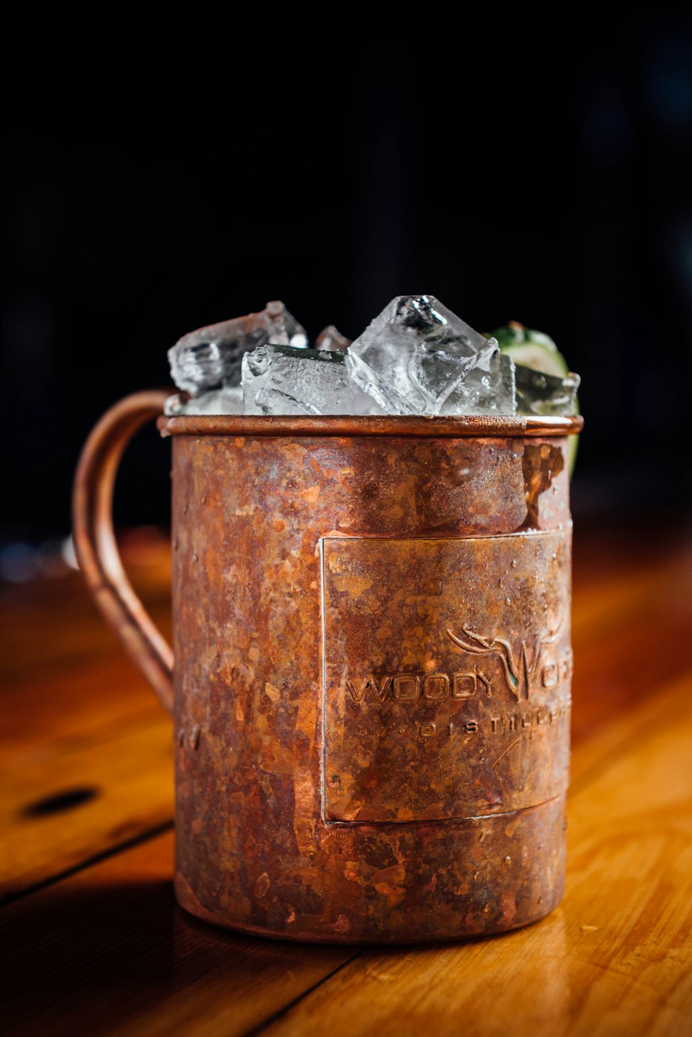 a glass mug with ice