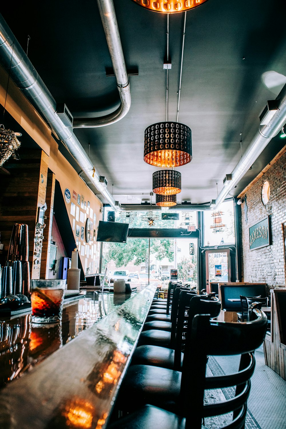 a bar with chairs and tables