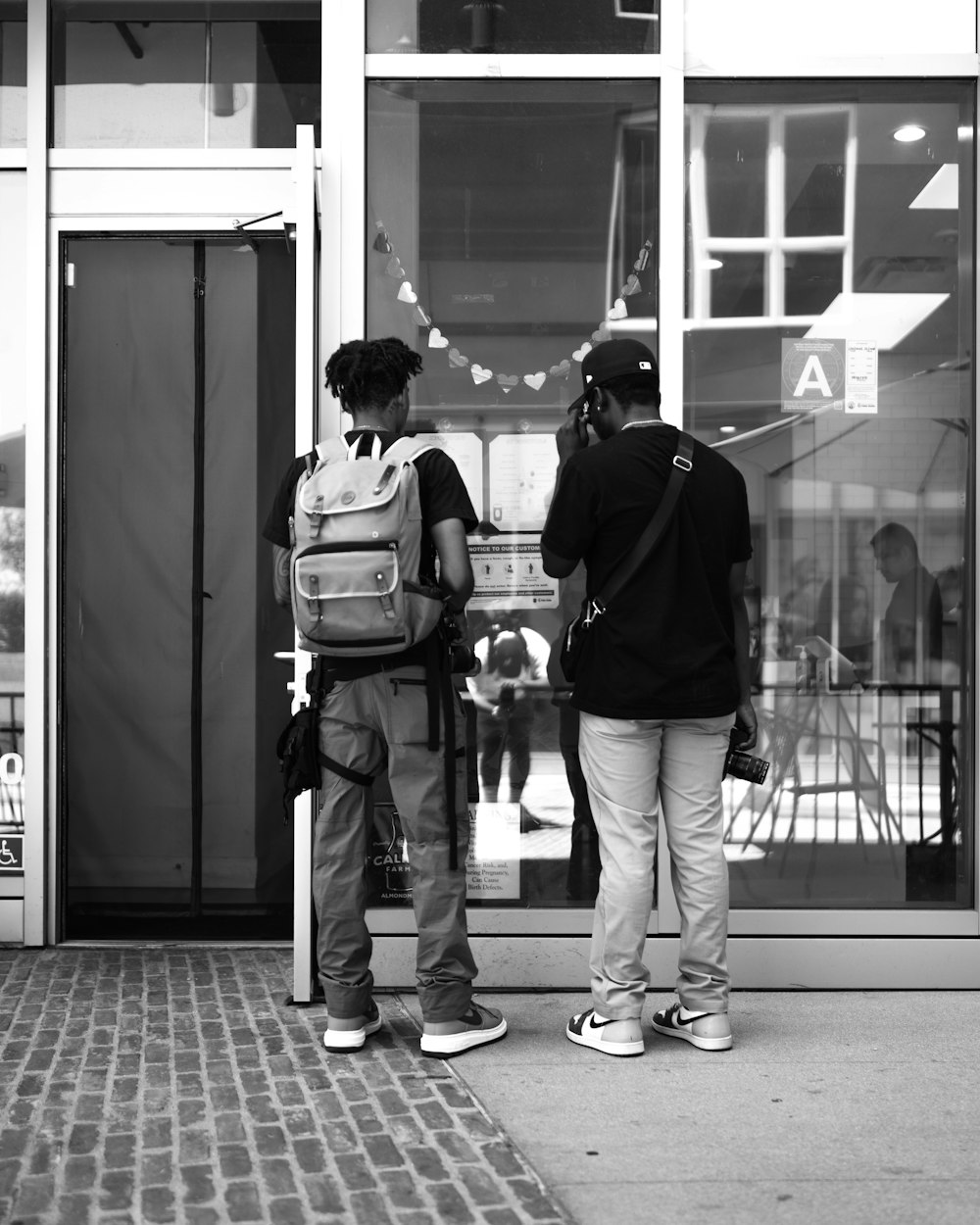 a group of people standing outside a building