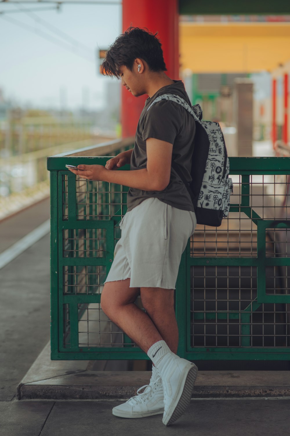 a person carrying a shopping cart