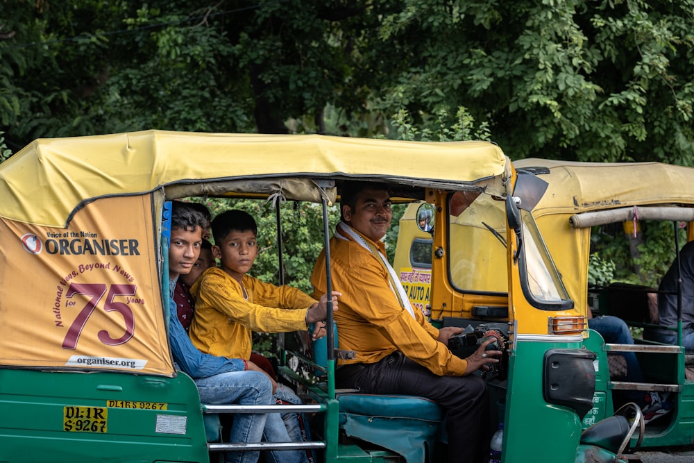 a group of people ride on a bus