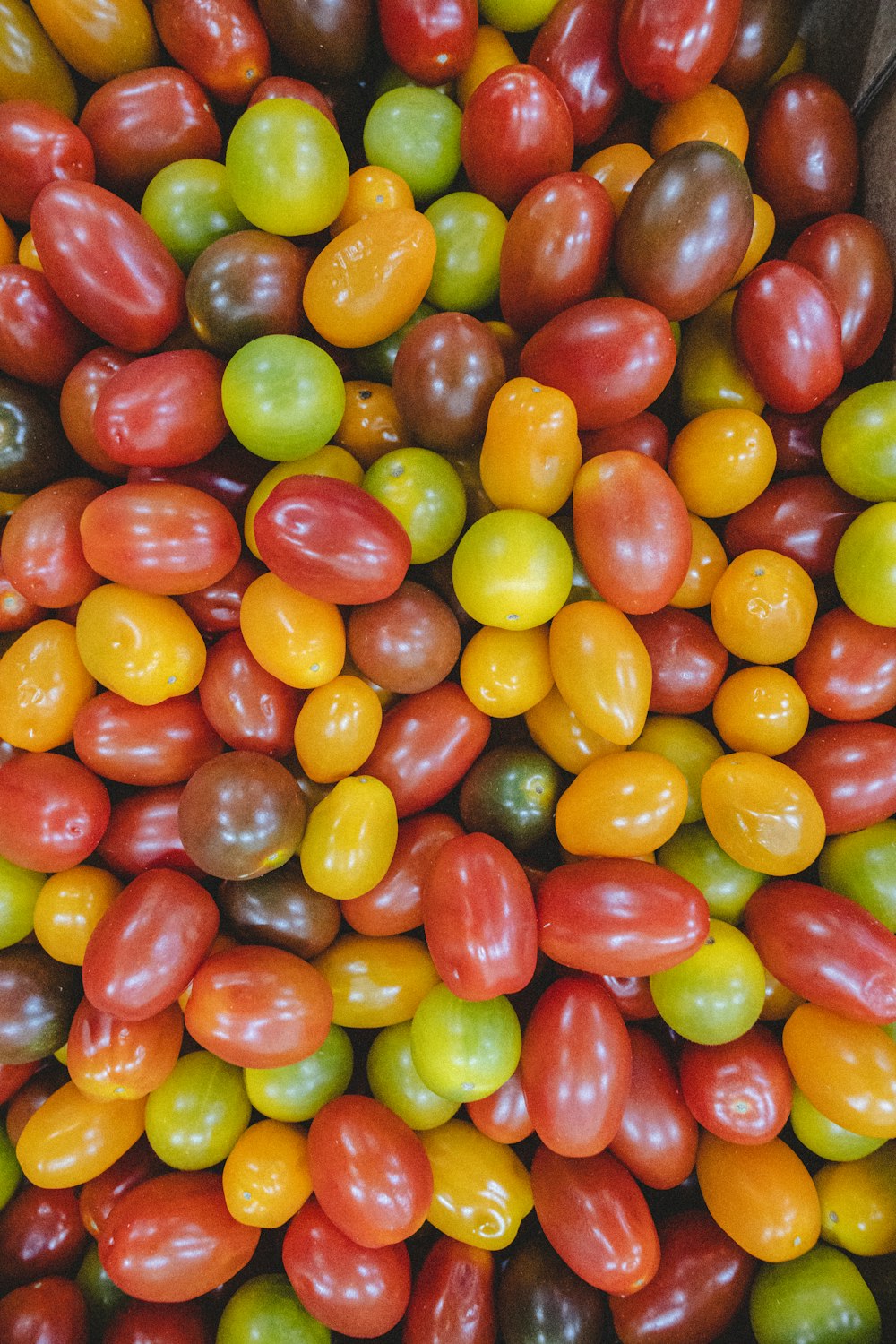 a pile of colorful round candies