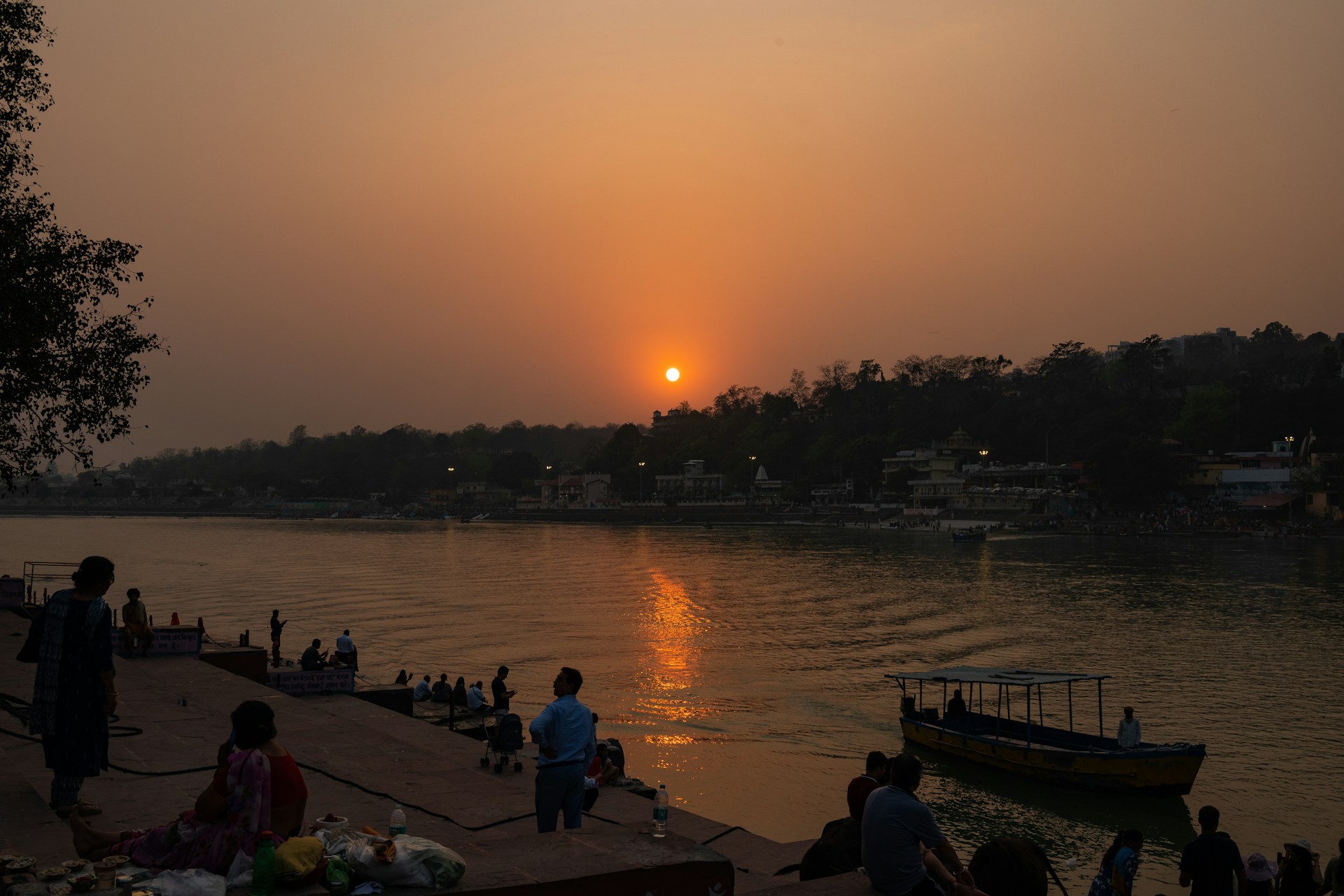 woman wearing yellow long-sleeved dress under white clouds and blue sky during daytime
