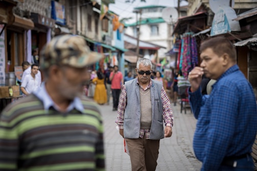 A lively street scene where the founder negotiates with a passerby holding colorful socks.
