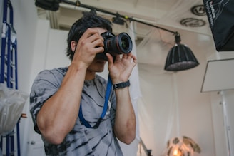 a man holding a camera
