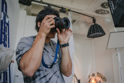 a man holding a camera
