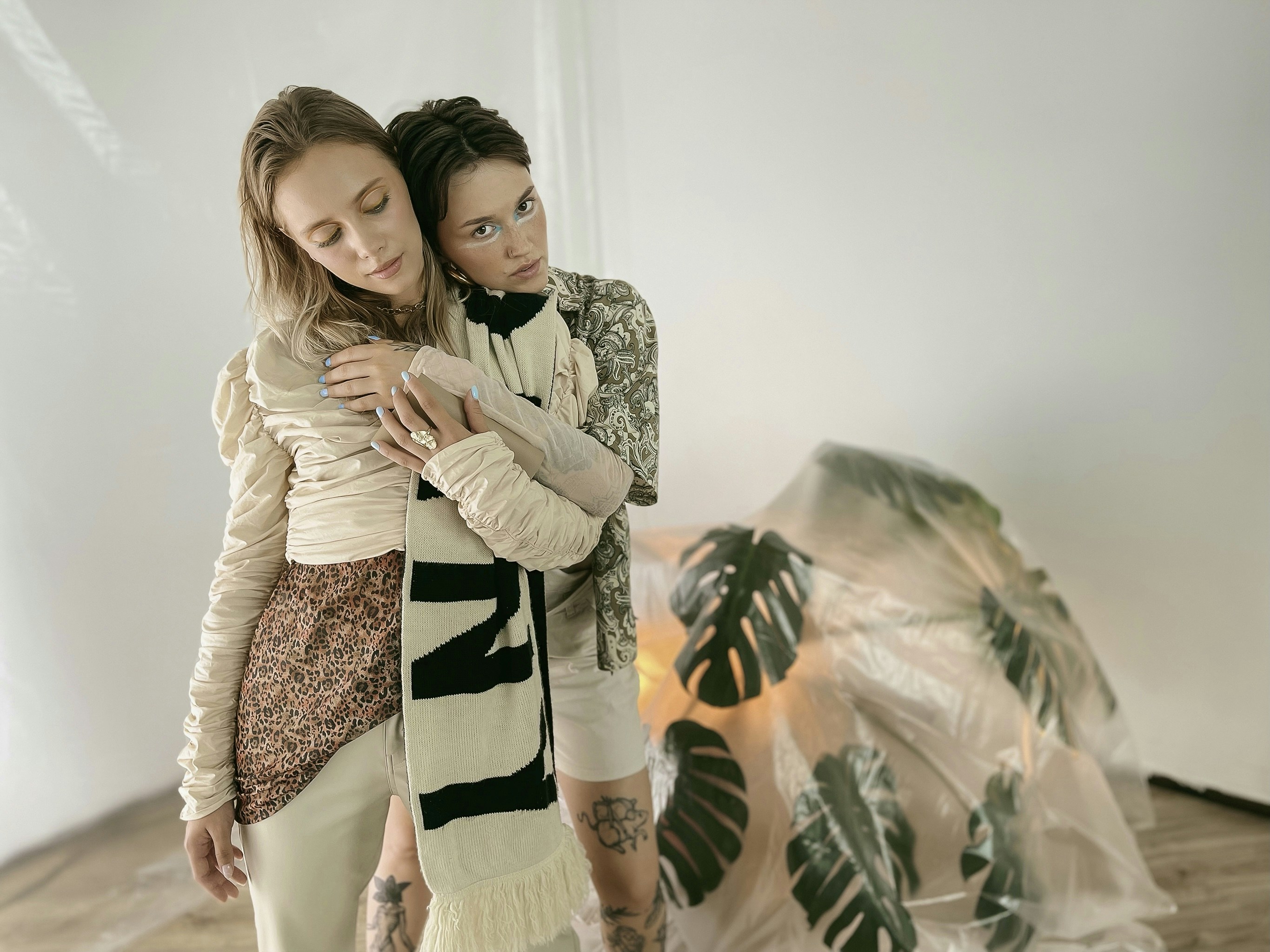 a couple of women posing for the camera