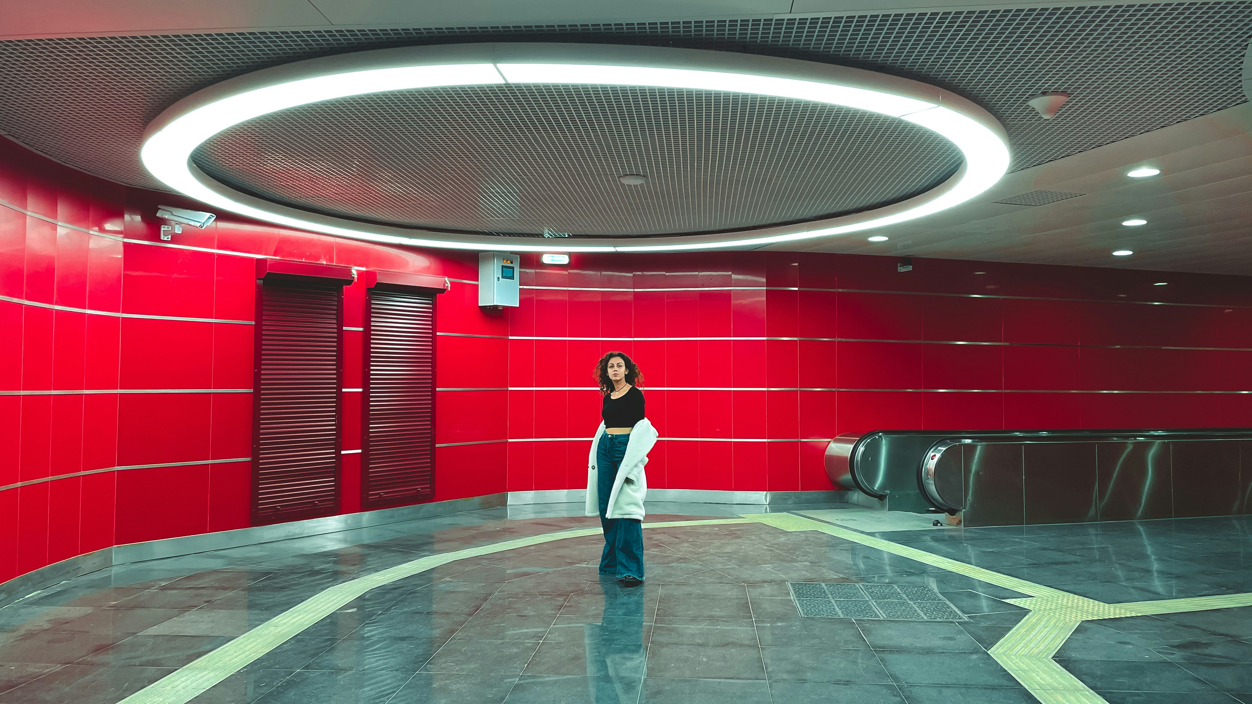 Person in neon lit room