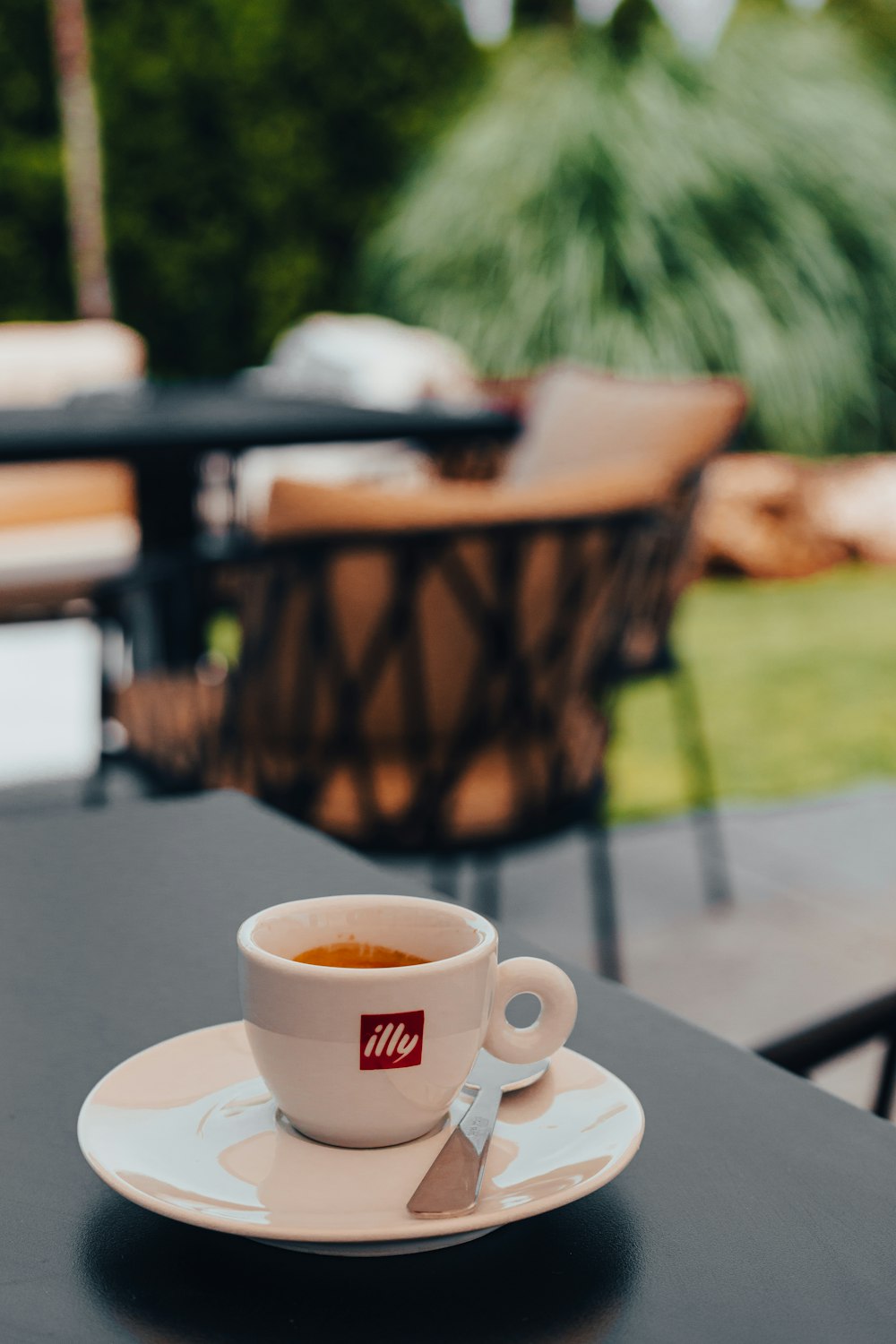 a cup of tea on a saucer on a table