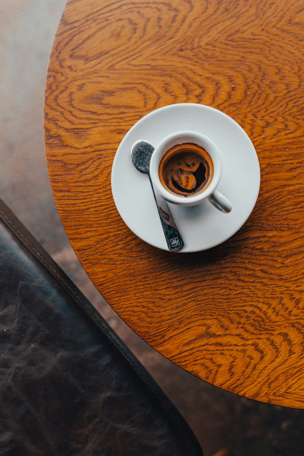 a cup of coffee on a saucer