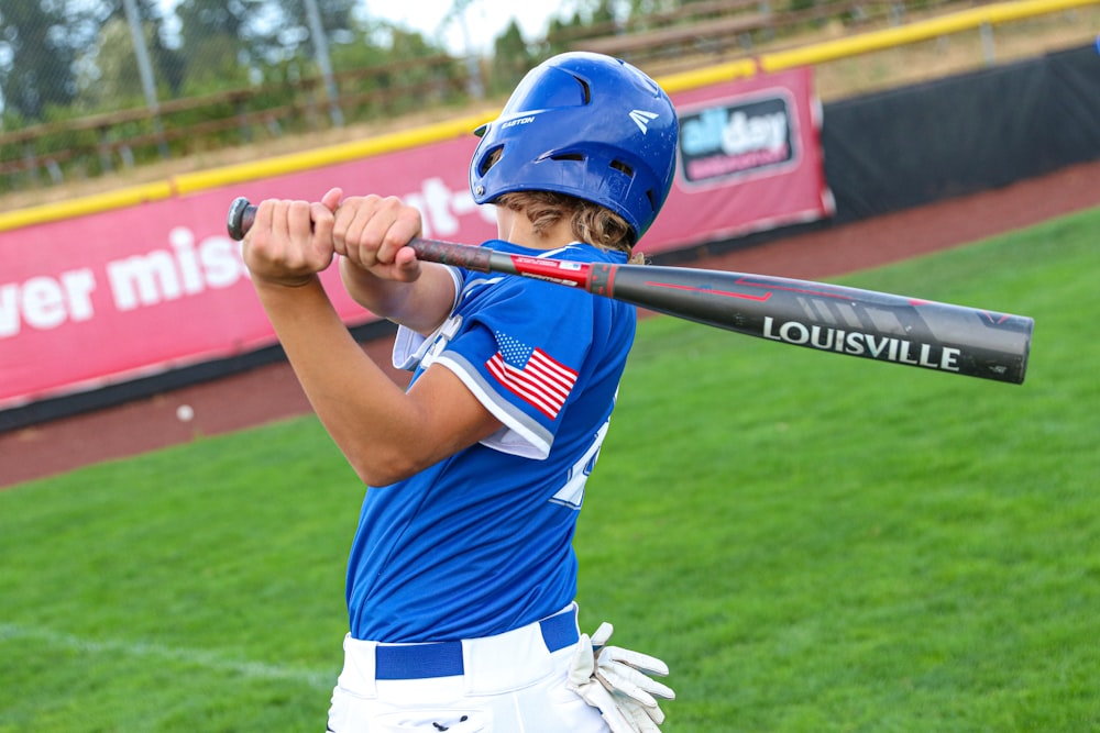 a young boy playing baseball