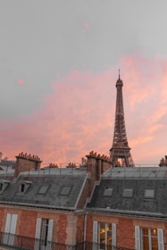 a tall tower behind a building
