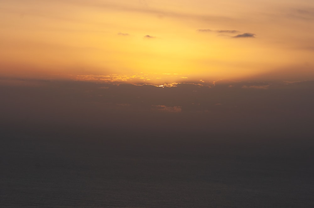 a view of the horizon of a large body of water