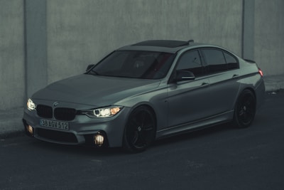 A sleek German sedan parked in an urban setting.
