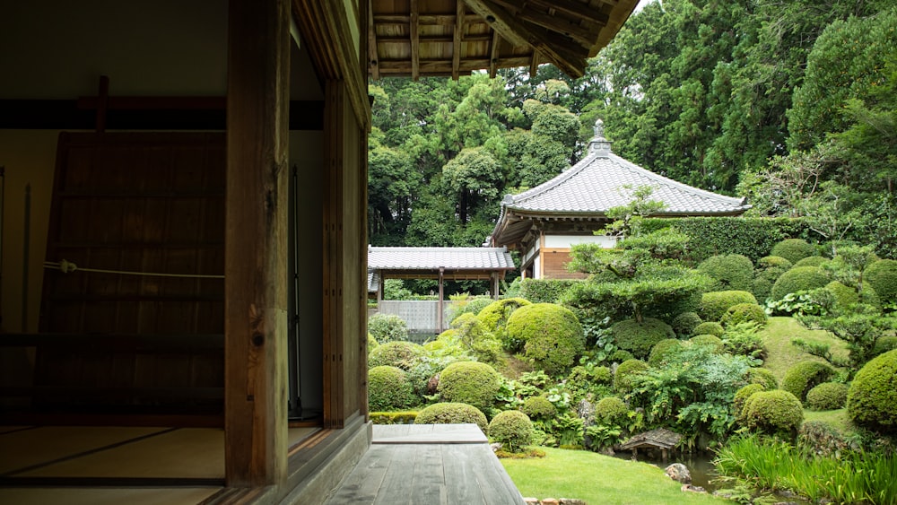 a wooden building with a garden