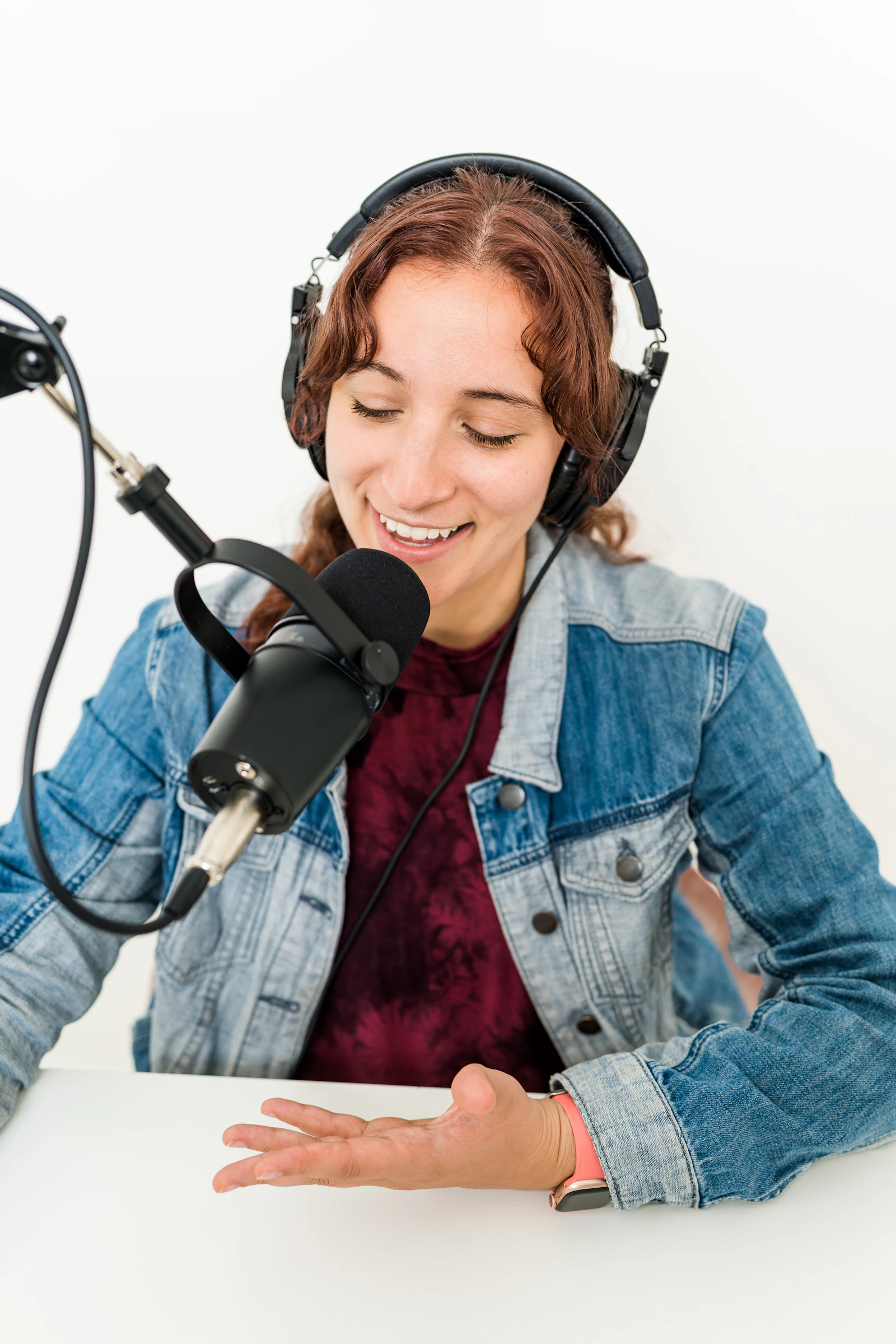 Sana Qureshi with headphones on