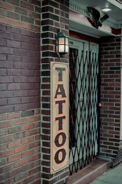 a sign on a brick wall