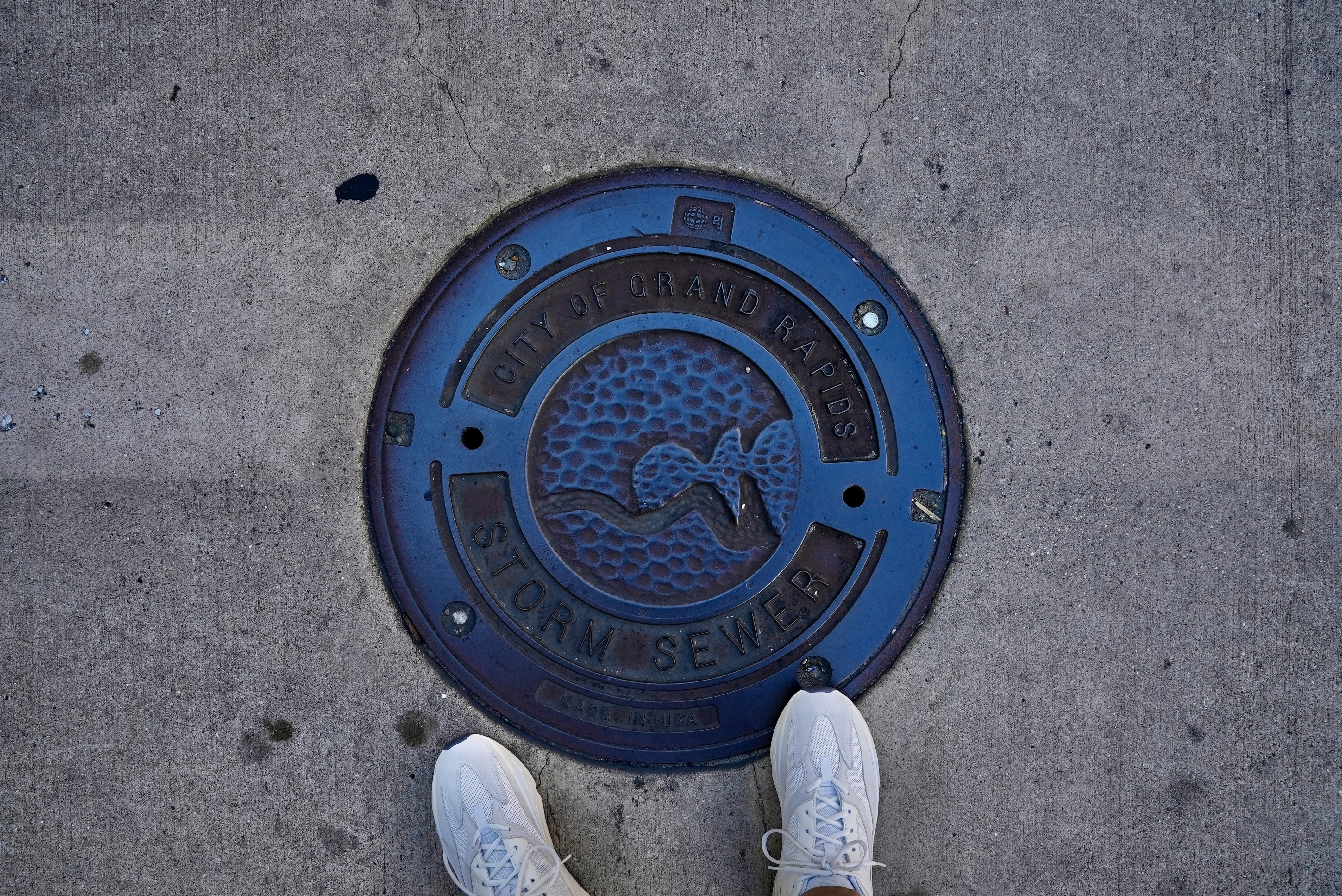 a person standing next to a record