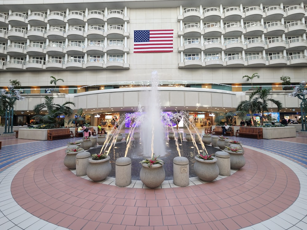 a fountain in front of a building